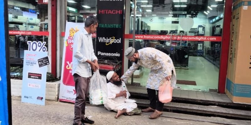 Food,Cloth and Rickshaw distribution program among the poor-17